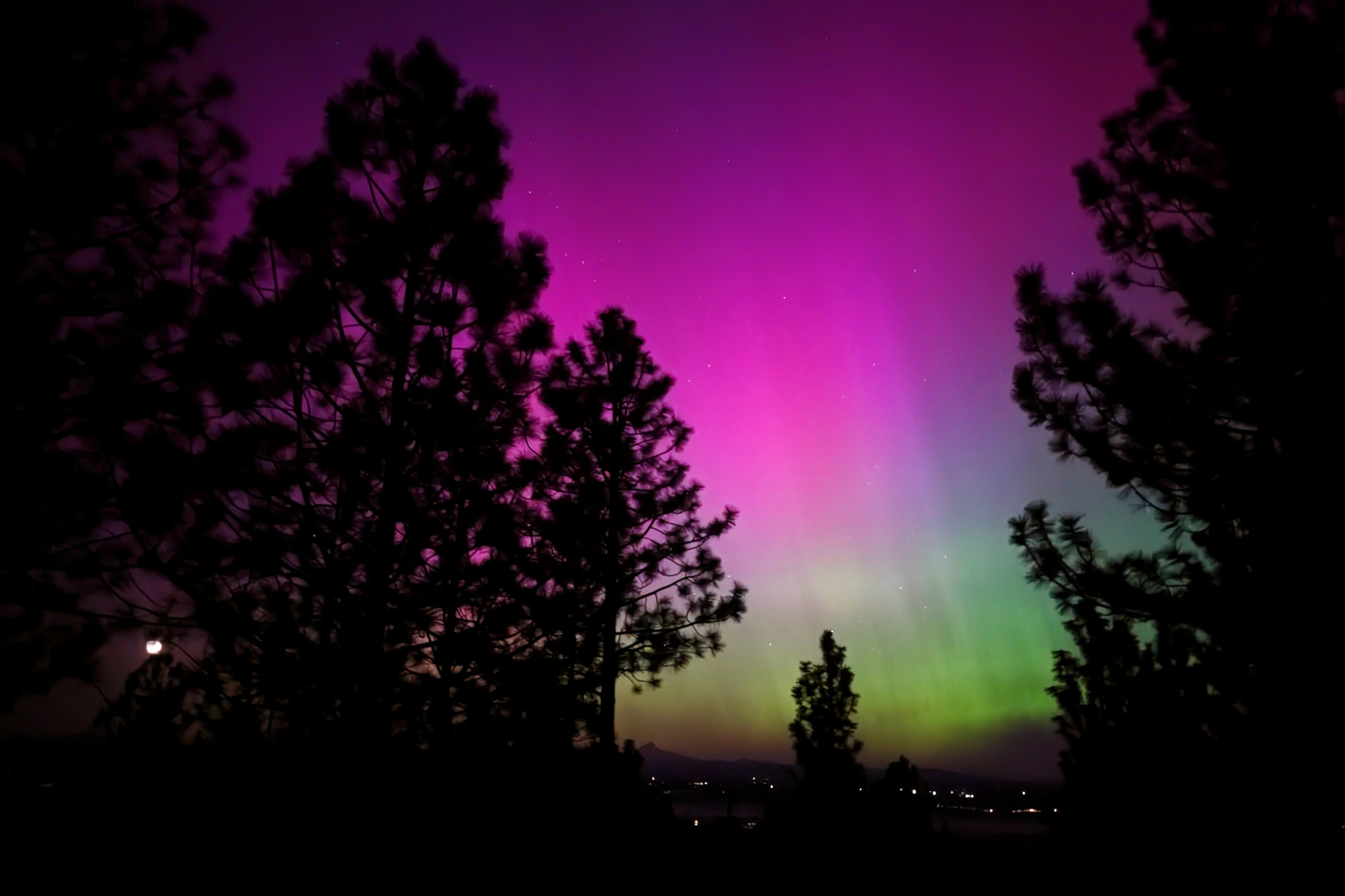 The northern lights dance above Mt. Jefferson on May 10, 2024, near Bend, Oregon.